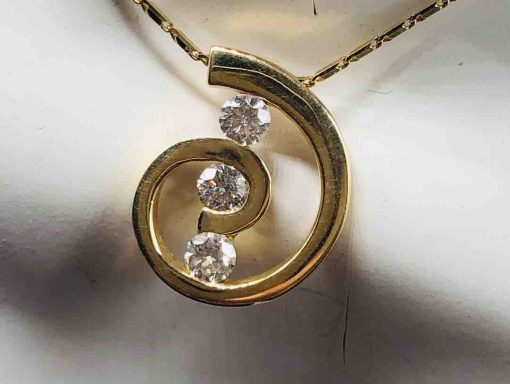 14 KT Yellow Gold Half Circle With 3 Solitaires