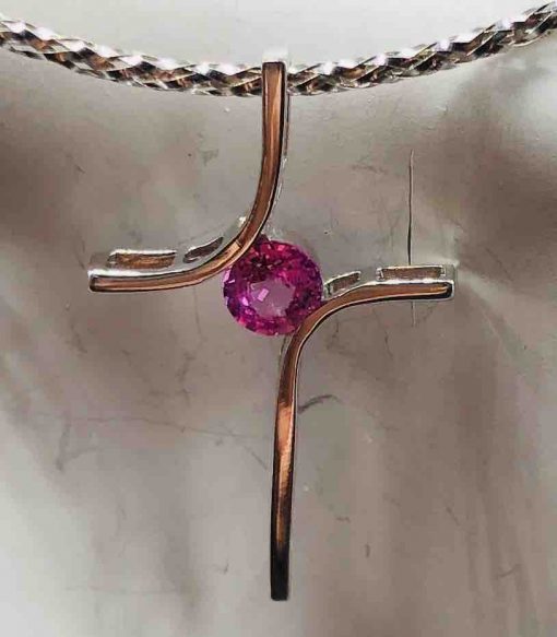 14 KT white Gold Cross With a Round pink Sapphire