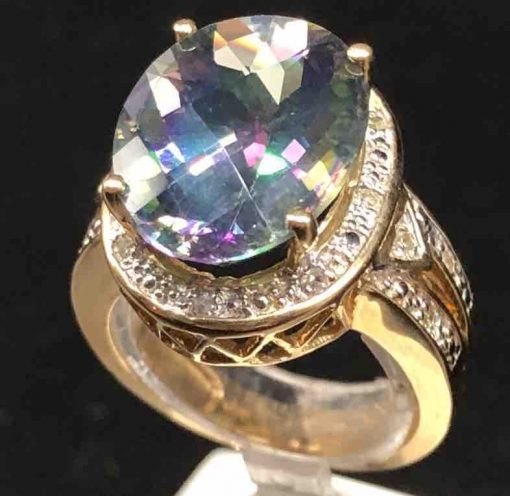 14 KT Yellow Gold Big Oval Caribbean Topaz Surrounded By Diamonds