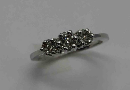 3 diamond flowers ring