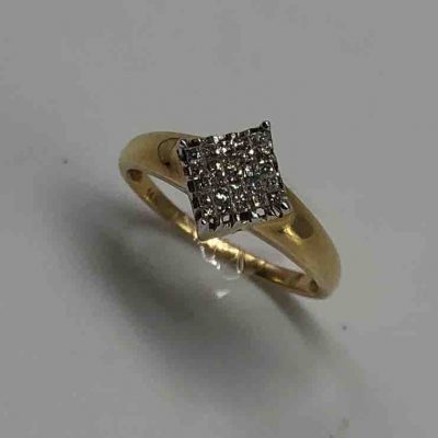 Simple Diamond Shaped Ring With Invisible Diamond Setting