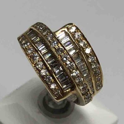Dome Style Diamond Ring With Baguettes